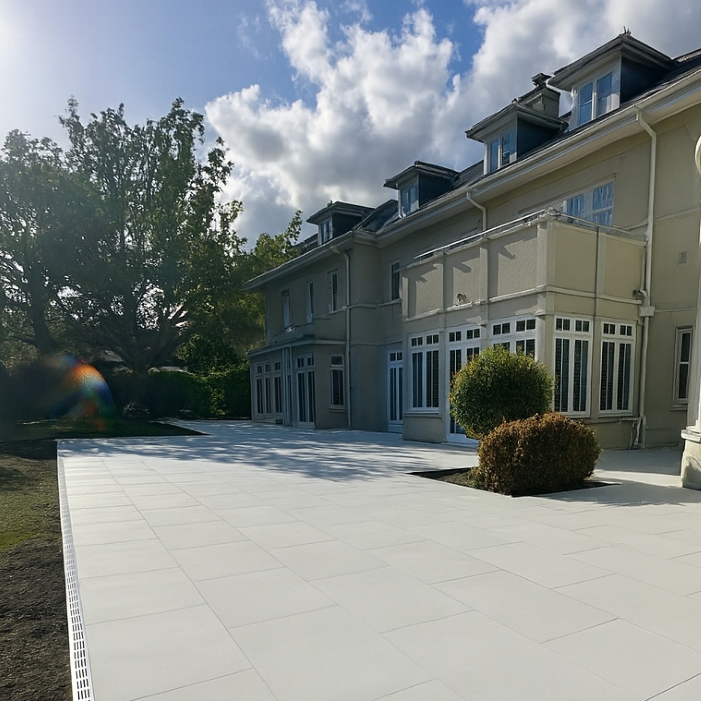 Over 300 sqm of porcelain patio laid at a large house in Oxshott, Surrey