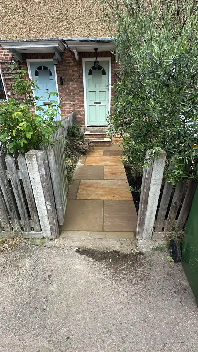 Sandstone front path leading through a picket gate to the front door, Surbiton